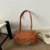 Bolso Femenino para Axila 2026 Nuevo de Moda Otoño de Gama Alta Vintage Casual Bolso de Hombro Versátil Bolso para Viajes Diarios