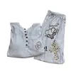 Nuevo conjunto de pijama de manga larga acanalado de seda helada con almohadillas en el pecho para mujer, nuevo estilo de primavera y otoño, conjunto de ropa para el hogar de gato perezoso