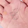 Anillo de punción multiusos retorcido Acero inoxidable europeo y americano Uña de ceja Uña de nariz Perforación de cuerpo humano Uña de labio Uña de hueso de oreja Joyería al por mayor