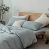 Juego de cuatro piezas de algodón 100% teñido en hilo y lavado, algodón puro, sin marca, suministrado por el fabricante, funda de edredón de alta calidad, sábana bajera de estilo japonés, ropa de cama al por mayor