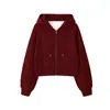 Sudadera con capucha nueva para otoño e invierno 2026, con una mezcla de tela de algodón y seda de leche, cuello cruzado, cierre de cremallera y un diseño casual de color liso