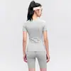Camiseta Personalizada para Esportes de Corrida ao Ar Livre Fitness Conjunto de Roupa para Treinamento de Pilates Roupas de Yoga de Secagem Rápida Manga Curta Feminino