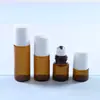 Botella de 1 ml con roll-on, botella de 2 ml con aplicador de bola, botella de 5 ml de vidrio para muestras pequeñas de viaje, color marrón, en stock