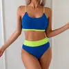 Traje de baño de dos piezas europeo y americano sexy con tiras para mujer, bikini de natación bikini de carreras hueco con bloques de color de tira de Amazon