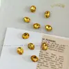 Pedras de strass para manicure douradas, modernas e deslumbrantes, apresentando designs de floco de neve, estrela de cinco pontas e cristal de vidro redondo com base pontiaguda, usadas como acessórios decorativos