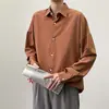 Camisa estilo Hong Kong color liso caída suelta prenda interior camisa de manga larga para primavera y otoño versión coreana para hombre ins top moderno canalla guapo