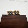 Pendientes de botón de plata S925 de alta calidad, trébol de cuatro hojas azul simple, con diamante, chapados en cobre con oro real, pendientes blanqueadores para mujer