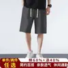 Shorts básicos casuales de color liso para hombre al por mayor, ajuste recto holgado, pantalones deportivos versátiles, pantalones de chándal ligeros, shorts hasta la rodilla