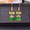 Estilo étnico retro colgante de ópalo esmeralda pendientes de lazo elegante temperamento de socialité joyería para orejas versátil para mujeres