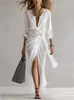 Vestido wrap plisado texturizado blanco transfronterizo 2026 con escote en V, mangas murciélago, cintura retorcida y abertura, ropa de mujer estilo resort