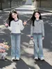 Conjunto de Primavera y Otoño para Niñas 2026 Nuevo Estilo Camiseta Falsa de Dos Piezas Infantil Moda de Niña Conjunto de Dos Piezas de Otoño Tendencia