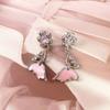 Pendientes de tuerca de circonio con colgante de mariposa rosa con incrustaciones de aceite de gota, aretes de clip para la oreja, pulsera, collar, serie de trajes, exquisita moda, accesorios versátiles para mujer