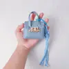 Nuevo y moderno popular versátil mini charm de bolso de platino para monedas, accesorio de bolso multifuncional portátil y llavero