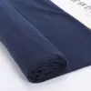 Tela Elástica Transpirable de Spandex Cian Antiencogimiento Absorbe el Sudor 32Scvc*55D Tela para Falda Larga Ropa Deportiva Procesamiento de Tela
