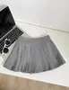 Falda Plisada de Lana de Albaricoque Engrosada para Mujer, Falda Anti-Exposición de Otoño e Invierno con Pantalones Cortos, Falda Corta de Línea A de Cintura Alta Adelgazante