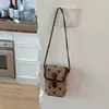 Las bolsas populares de este año para mujer 2026 Otoño/Invierno Nuevo a la Moda Moda Tendencia Bolso de Hombro Único a Cuadros para Teléfono Diseño de Nicho Bolso Cruzado