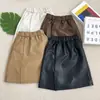 Falda de Cuero Rantuo para Niñas con Abertura, de Longitud Media, Cintura Alta Elástica, Artículo Popular de Tiktok, Estilo Ins, Stock Listo para Exportación, Dropshipping