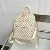 Mochila de Moda Transfronteriza Estilo Universitario con Múltiples Bolsillos Tendencia de Estampado 2026 Gran Capacidad para Viajes al Aire Libre