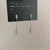 Pendientes largos de gota de agua con circonitas de lujo y luz, diseño para mujer, personalidad de nicho, pendientes de moda con temperamento simple y combinable.