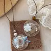 Diseño de estilo bohemio sombrero de paja colgante tejido collar tejido a mano sensación de alta gama collar estilo vacación en la playa