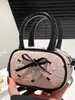2025 Nuevo Bolso de Hombro Cruzado Pequeño Cuadrado con Lunares y Lazo Estilo Coreano de Nicho para Mujer
