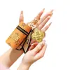 Pingente de bolsa de celular da sorte trevo de quatro folhas dourado, chaveiro de ouro maciço, pingente de bolsa para batom, pequeno presente promocional para o Festival Qixi