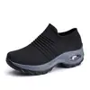 Zapatos de mujer de talla grande transfronterizos con amortiguación de aire, zapatillas tejidas voladoras, zapatos de overol, zapatos mecedores casuales de moda, zapatos tipo calcetín, venta al por mayor, generación