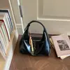 Elegante bolsa de mão pequena para mulheres, nova bolsa de ombro da moda de verão 2026, bolsa transversal versátil de nicho