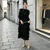 Venta caliente transfronteriza Miyake alta gama sentido volantes vestido midi mujer otoño temperamento estilo suave elegante falda de manga larga