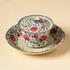 Taza de té de cerámica hecha en fábrica con diseños de loto y peonía, juego de té kung fu para uso doméstico, cuenco de té con tapa que no quema las manos