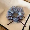 Novo scrunchie estiloso com estampa de leopardo para estilizar o cabelo, elástico de rabo de cavalo vintage, acessório de cabelo doce e cool de alta qualidade