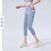 Pantalones de Yoga Cropped con Bolsillo Lateral para Mujer 2026 Transfronterizos de Cintura Alta para Gimnasio Levantamiento de Glúteos Melocotón Pantalones de Fitness Leggings Deportivos