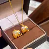 Lujo Ligero Vintage Chapado en Oro Diseño de Nicho Oro Antiguo Diamante Azul Elefante de la Suerte con Ojos de Estrella Cadena para Clavícula