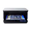 El pequeño detector de moneda multipaís con discriminador de billetes de color morado 180 puede detectar cheques de tarjetas de identificación y otros billetes.