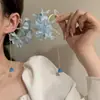 Modernos y Atmosféricos Aretes de Clip Estilo Bosque con Borlas Florales para Mujer, Frescos y Elegantes Aretes de Clip de Playa para Fotografía