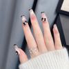 Colección de joyería para uñas negras cuatro mans estrella lazo perla flor amor oso usar armadura decoraciones al por mayor