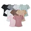 Camiseta de manga corta ajustada con cuello en U para mujer, nuevo estilo de verano 2026, top corto ajustado de color liso llamativo con cintura descubierta