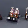 Suportes de exibição coloridos de acrílico para atacado, suportes de exibição de caixa cega para brinquedos, suportes de exibição de acrílico para perfumes, suportes de exibição de escada de acrílico