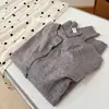 Cardigã de malha macio e confortável com gola redonda e mangas compridas, novo estilo de primavera deste ano, coreano, suave, rejuvenescedor, versátil, modelador, top