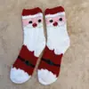 Calcetines de Navidad de coral de otoño e invierno, calcetines de suelo cálidos para el hogar de terciopelo medio, calcetines de Navidad de Papá Noel