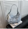 Bolso bandolera versátil de alta gama, casual de nicho, estilo dulce de lazo simple popular de este año, portátil, en forma de media luna