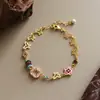 Pulseira de Flor Esmaltada Borboleta Vazada Exquisita Retro Moda Luxo Leve Nicho Temperamento de Alto Padrão Joia Versátil Feminina