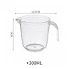 Taza medidora con escala Taza de plástico Resistente a altas temperaturas Taza medidora pequeña Cuchara medidora Tienda de té con leche Herramienta de repostería Hogar