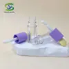 Shanyi Nuevo Tubo Redondo Morado Transparente con Forma de Corazón para Brillo de Labios Tubo de Plástico para Brillo de Labios Vacío Materiales de Empaque al por Mayor