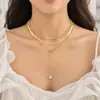 Collar de cadena de hueso de serpiente de metal de nicho de hip hop con joyería transfronteriza europea y americana, colgante de perla simple que combina con todo, collar de clavícula