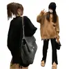 Suéter casual de punto con cuello de borlas estilo coreano para mujer, diseño de otoño e invierno, tejido de nicho, top holgado y favorecedor