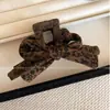Pinza para el Cabello con Estampado de Leopardo Retro para Mujer 2025 Nuevo Clip de Flequillo de Gama Alta Clip para Cabello Suelto Clip de Cabello Elegante Versátil Otoño e Invierno Accesorios para el Cabello