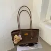 Nuevos Dijes para Bolsos Mini Simples Sensación de Alta Gama Bolsos de Tote Perezosos para Vacaciones para Mujeres Otoño Invierno Bolsos de Mano Retro