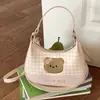 Bolso de cuadros de nicho exquisito y moderno para mujer, nuevo modelo 2026, minibolso cruzado versátil, bolso tipo dumpling, bolso de mano pequeño para salir
