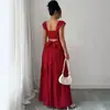 Vestido Rojo de Lunares sin Espalda de Venta Caliente 2026 para Mujer, Nuevo Estilo de Verano, Ceñido a la Cintura, Adelgazante, Estilo para Vacaciones en la Playa Vestido Largo